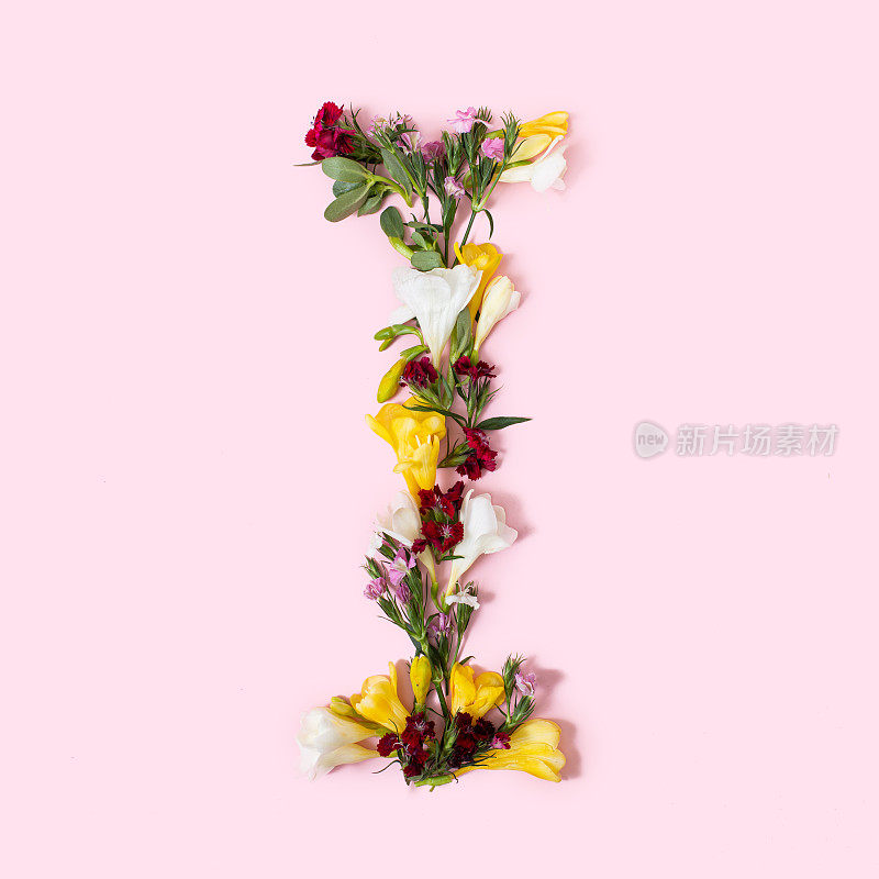 Letter I made of natural flowers, petals and leaves. Floral font concept. Collection of letters and numbers. Spring, summer and holidays creative idea.